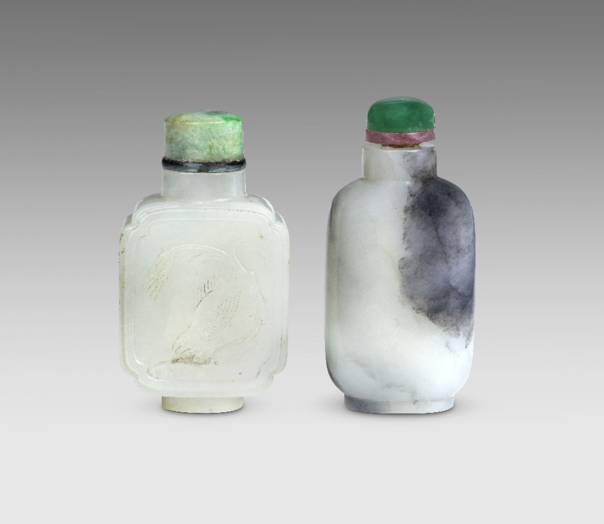 A GREY JADE SNUFF BOTTLE AND A WHITE JADE 'QUAIL AND MILLET' SNUFF BOTTLE 18th/19th century (4)