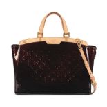 Louis Vuitton: an Amarante Monogram Vernis Leather Brea GM 2010 (includes shoulder strap)