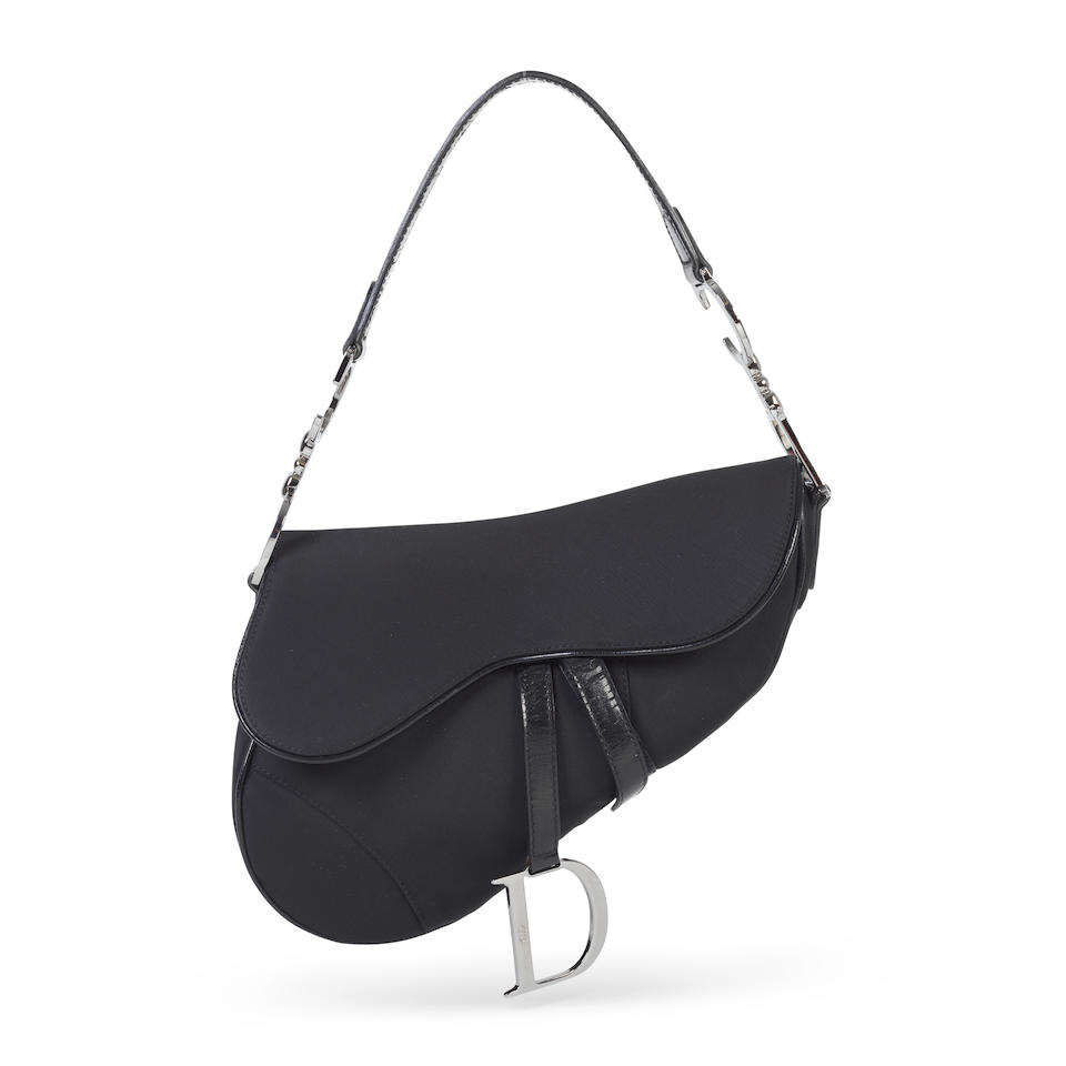 John Galliano for Christian Dior: a Black Nylon and Patent Leather Saddle Bag 2002 (includes dus...