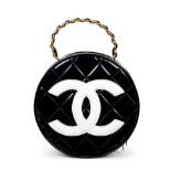 Karl Lagerfeld for Chanel: a Black and White Patent CC Round Vanity Case Spring 1995 (includes s...