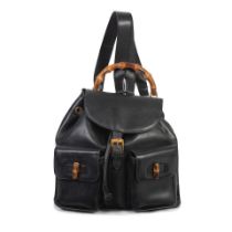 Gucci: a Black Leather Medium Bamboo Backpack Late 1990s