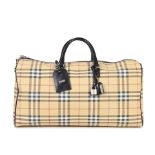 Burberry: a Beige House Check Holdall 2000s (includes padlock, keys and luggage tag)
