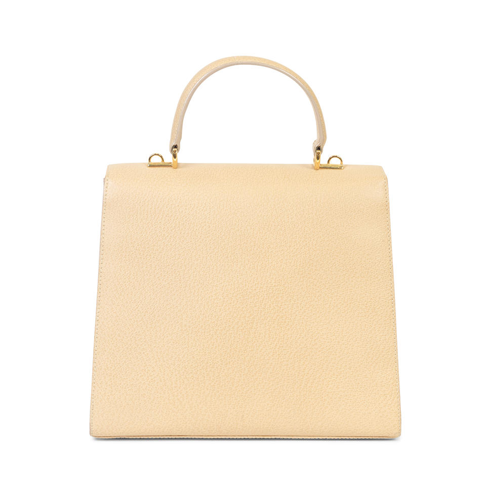Gucci: a Beige Pigskin Lady Rock Handbag 1990s (includes gilt backed mirror) - Image 2 of 2