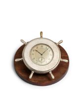 VACHERON CONSTANTIN. AN UNUSUAL SILVER AND WOOD DESK CLOCKc. 1913