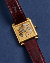CARTIER. A FINE AND RARE LIMITED EDITION 18K GOLD MANUAL WIND SKELETONIZED WRISTWATCH Tank Obus,...