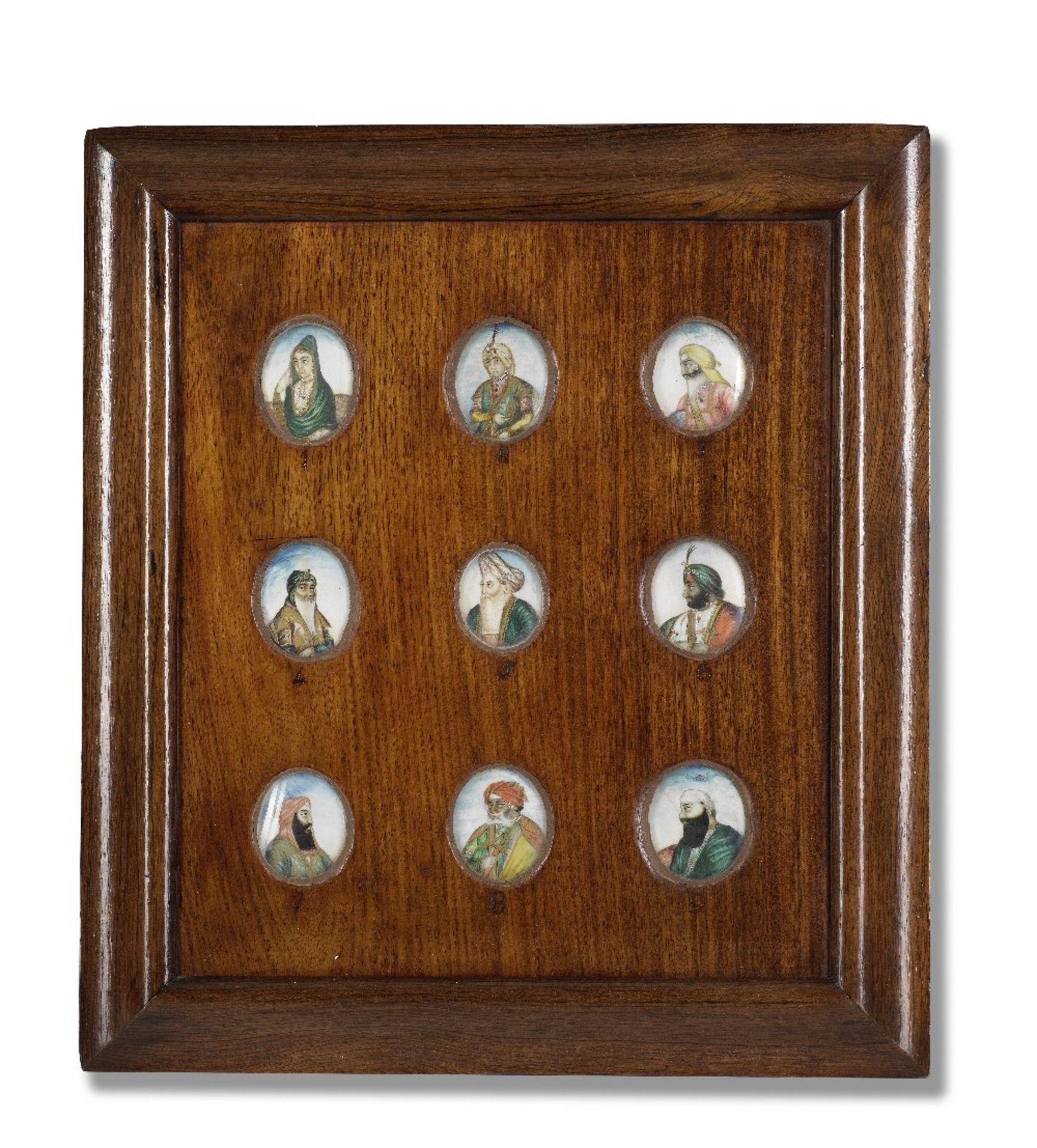 A framed group of nine miniatures on ivory depicting Sikh notables, including Maharajah Ranjit S...