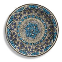 A large Sultanabad pottery dish Persia, 14th Century