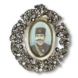 A miniature portrait of Nasr al-Din Shah Qajar (reg. 1848-96) in a diamond-set silver frame Pers...