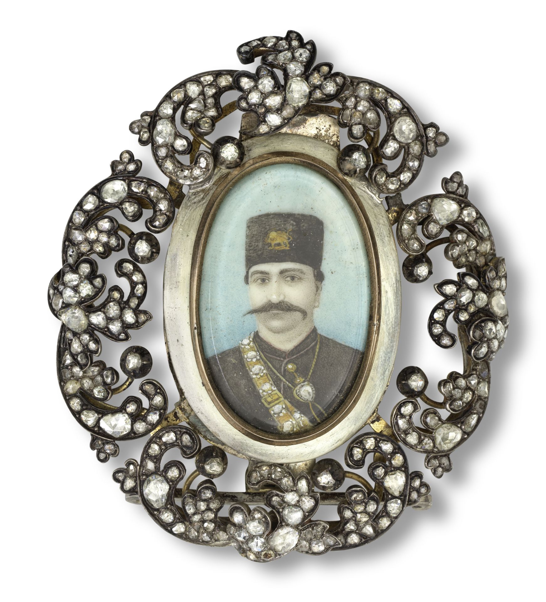 A miniature portrait of Nasr al-Din Shah Qajar (reg. 1848-96) in a diamond-set silver frame Pers...