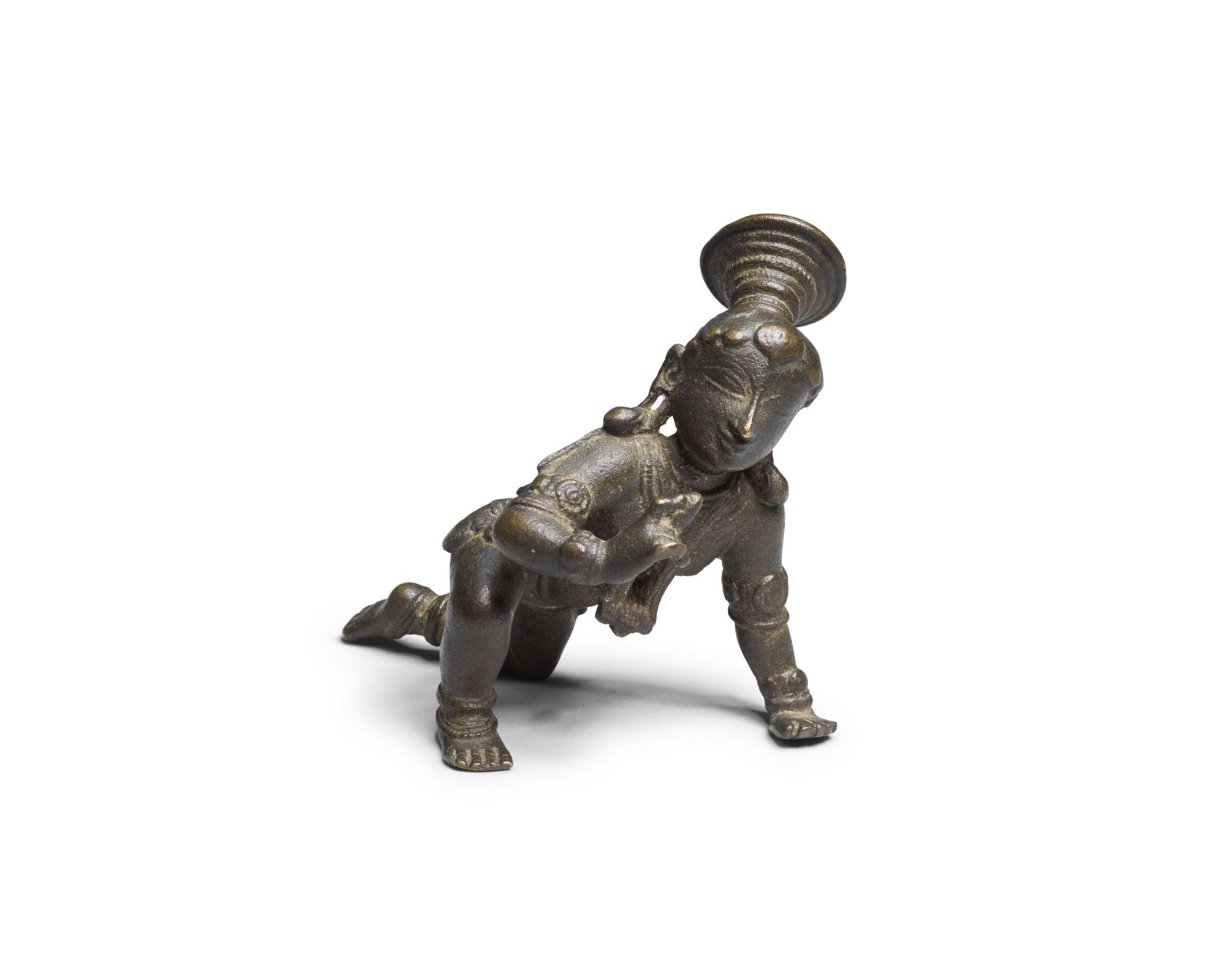 A bronze figure of Krishna the butter thief Tamil Nadu, Vijayanagara Period, 14th-16th Century