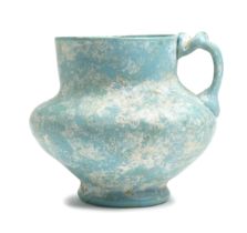 An opaque turquoise glass jug Persia or Egypt, 11th/ 12th Century