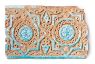 A Timurid moulded pottery tile Central Asia, 14th Century