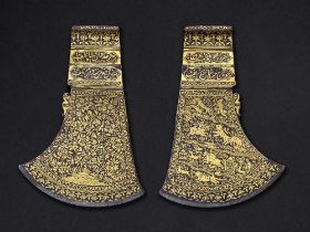 A fine gold-inlaid steel axe head signed by Muhammad Sadiq bin Muhammad Ya'qub India, 18th Century