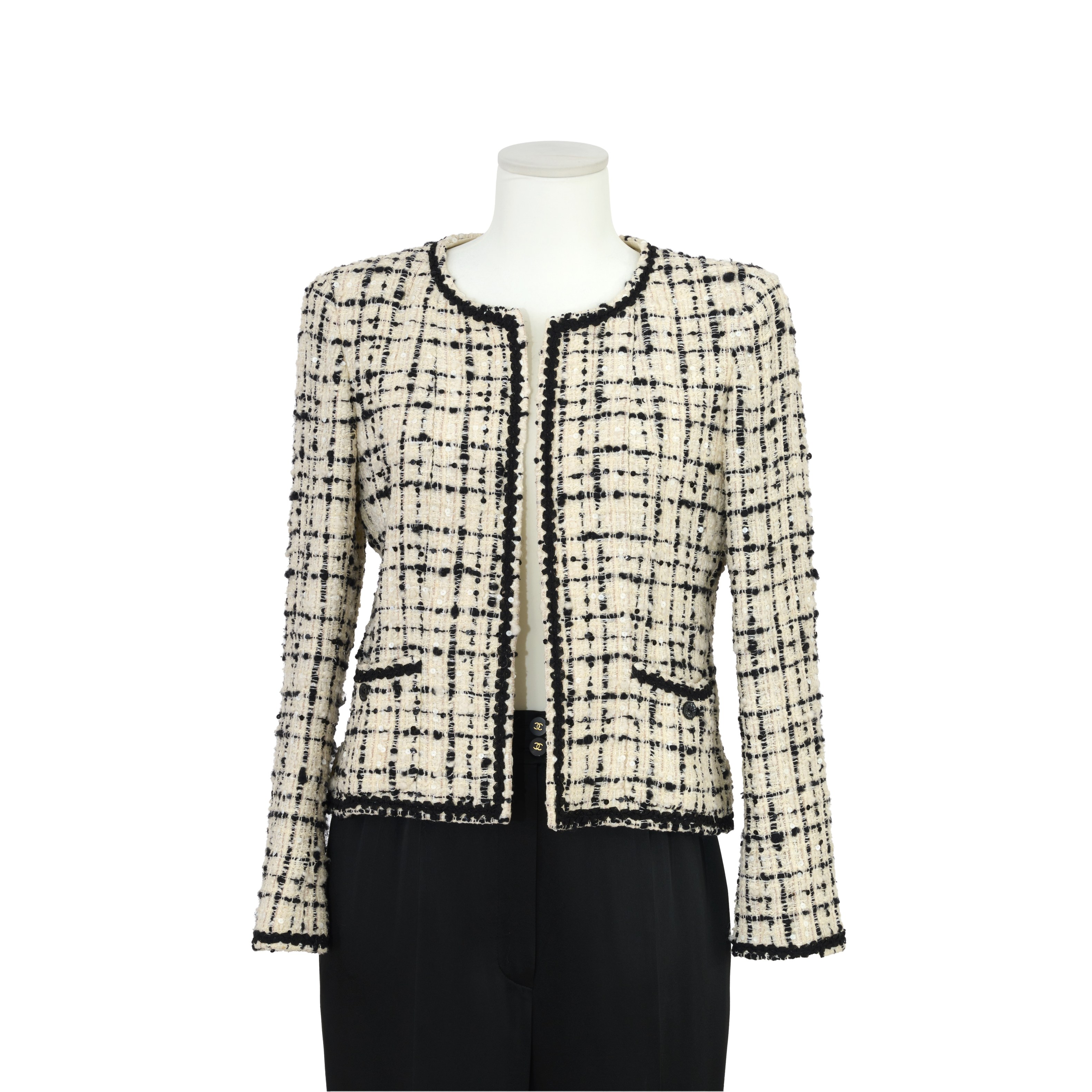 CHANEL, Collection Pr&#234;t &#224; Porter Croisi&#232;re 2003. Veste en tweed noir et blanc. Di...