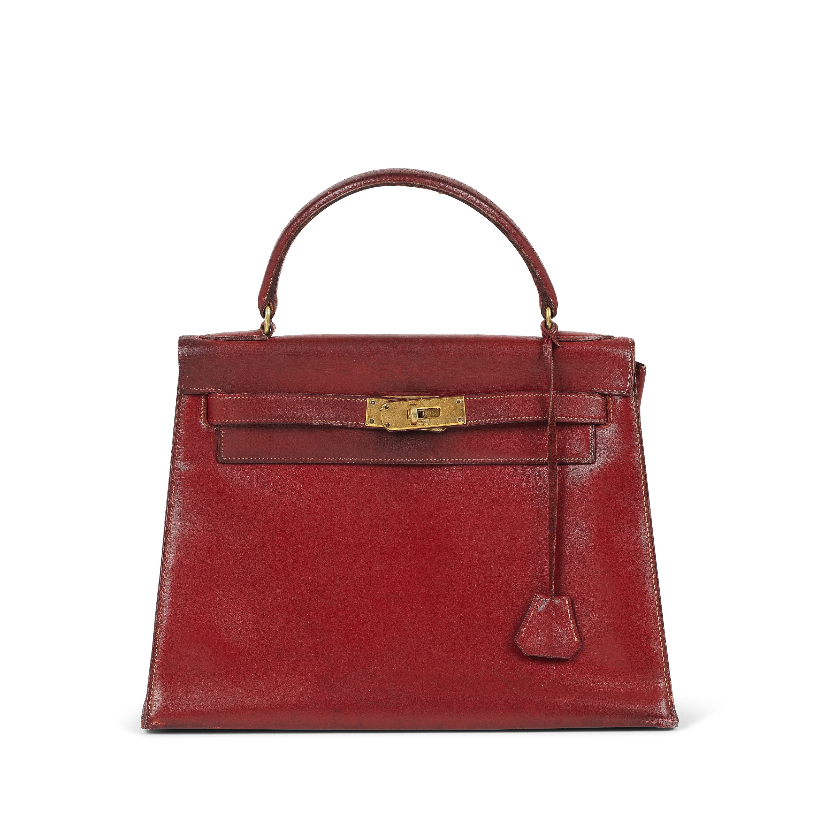 HERMES Paris, circa 1960. Sac 'Kelly Sellier' en cuir box bordeaux.