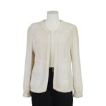 CHANEL, Collection Pr&#234;t &#224; Porter, circa 1980. Veste en coton crochet&#233; blanc cass&...