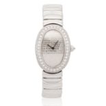 Cartier. A lady's 18K white gold diamond set quartz bracelet watch Baignoire, Ref: 1955, Circa ...