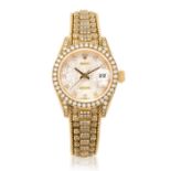 Rolex. A lady's 18K gold diamond set automatic calendar bracelet watch Datejust, Ref: 69158, Ci...