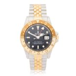 Rolex. A stainless steel and gold automatic calendar bracelet watch with dual time zone GMT-Ma...