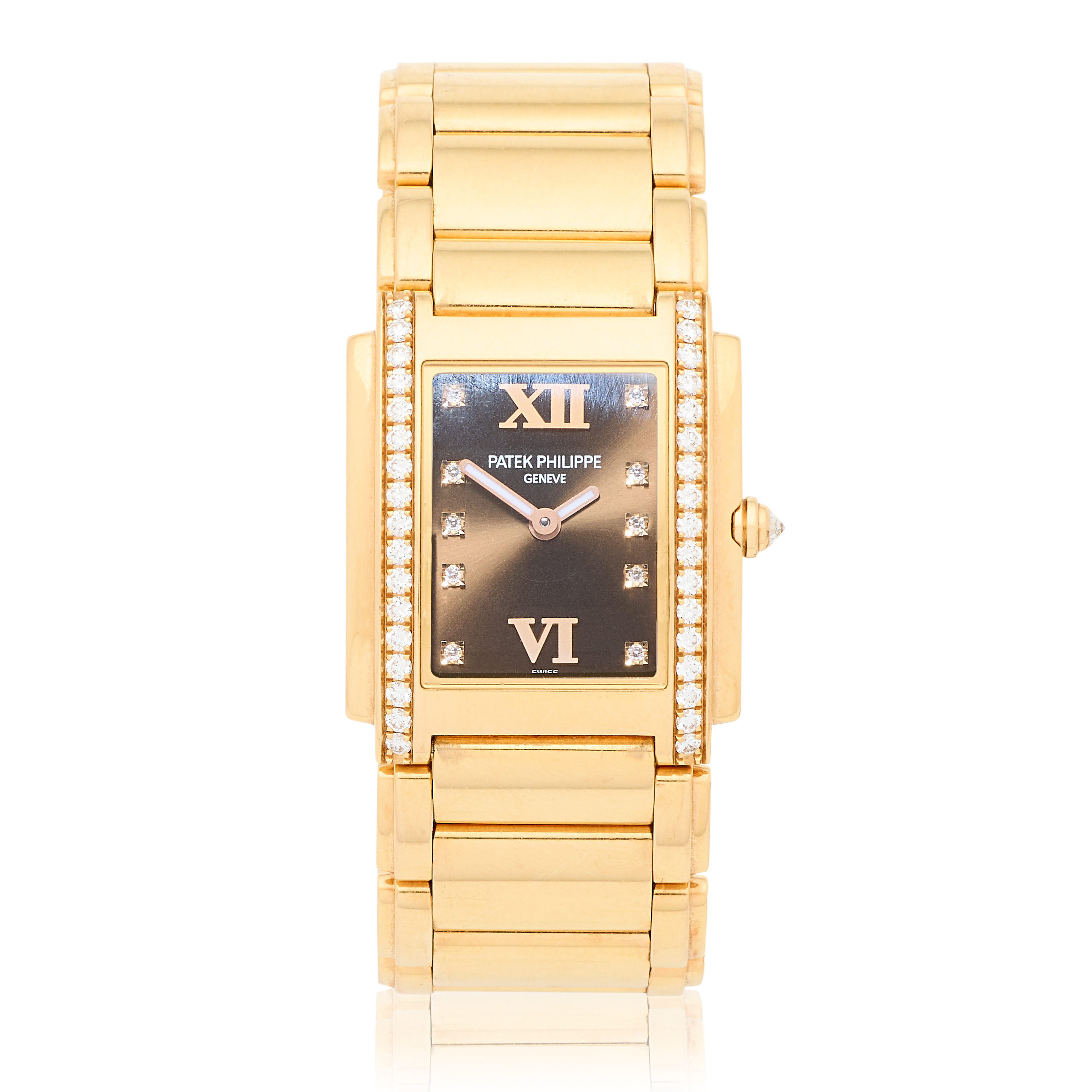 Patek Philippe. A lady's 18K gold diamond set quartz bracelet watch Twenty 4, Ref: 4910/11, Cir...