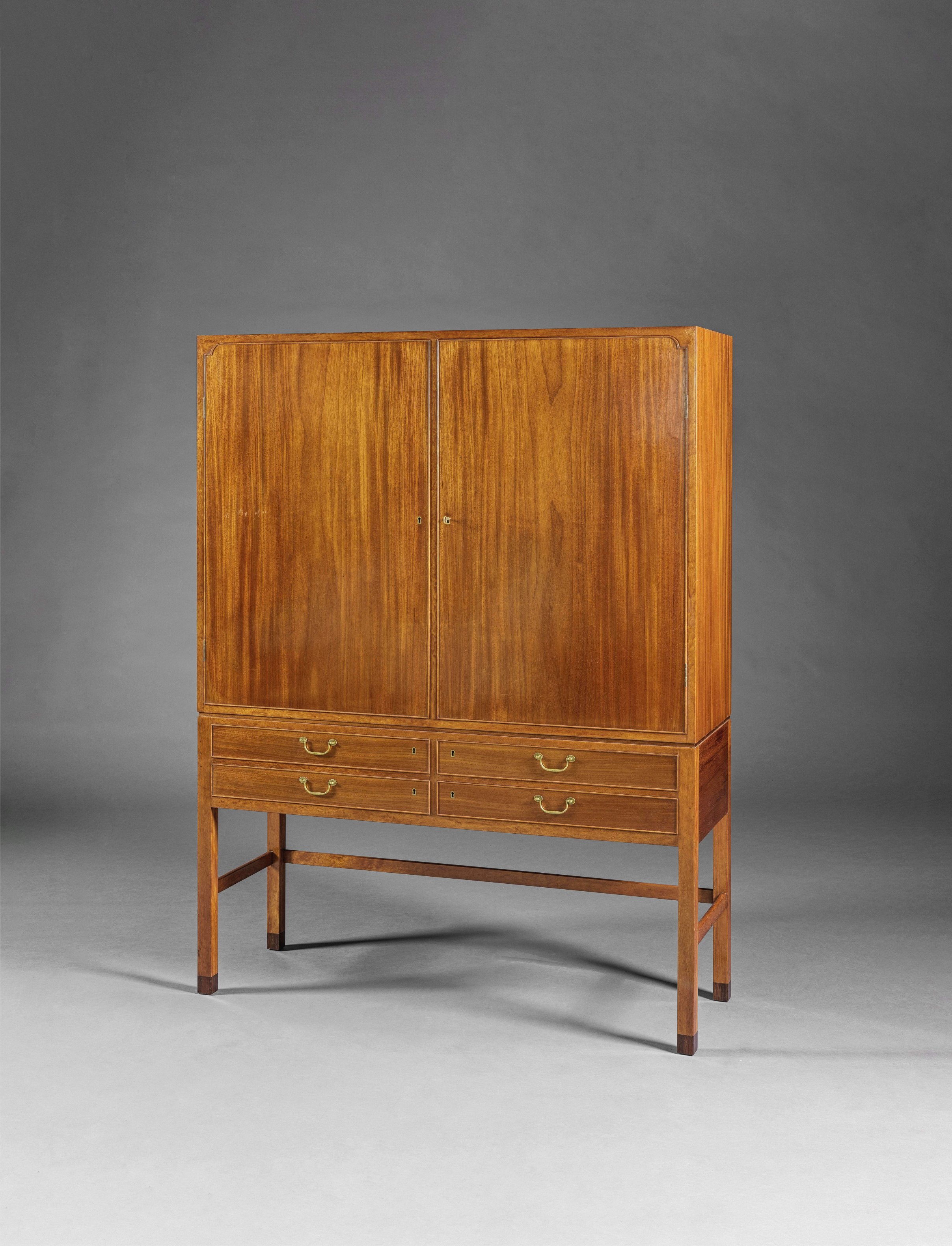 OLE WANSCHER (1903-1985) CabinetCirca 1940Edition A. J. IversenAcajou et laitonH: 161cm. (63.3/8...