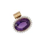 A 12K GOLD, AMETHYST, AND DIAMOND ENHANCER PENDANT