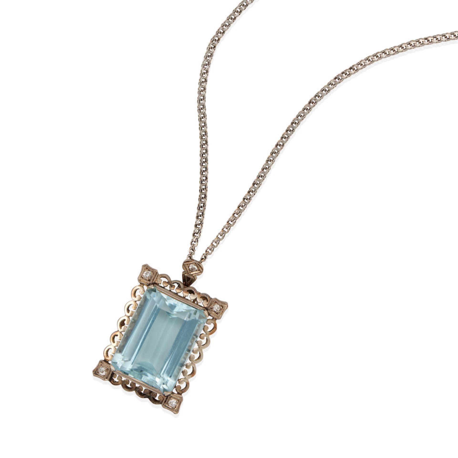 A 14K WHITE GOLD, BLUE TOPAZ AND DIAMOND PENDANT NECKLACE