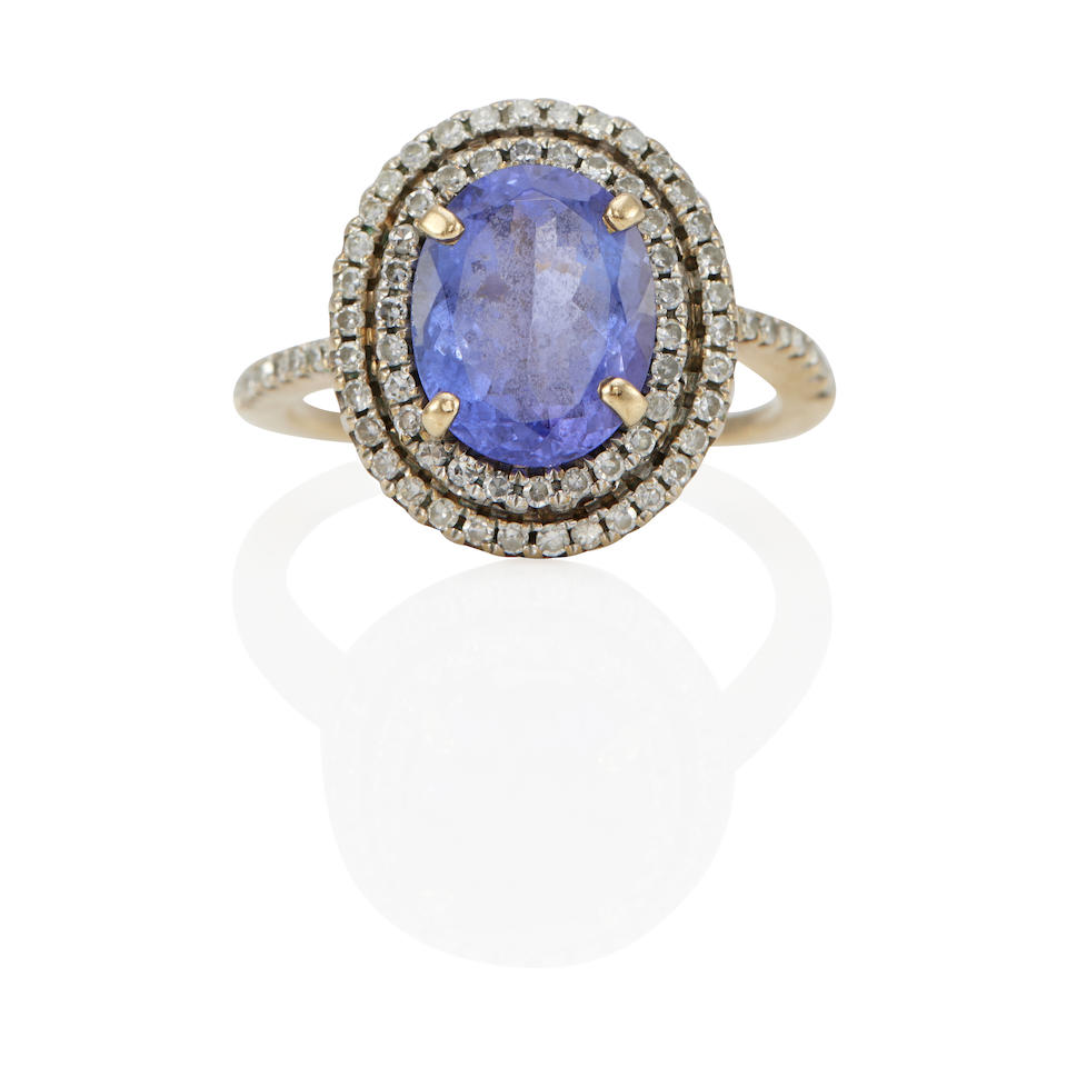 A 14K GOLD, TANZANITE AND DIAMOND RING