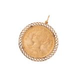 A 14K GOLD PENDANT WITH 21K GOLD CHILEAN COIN