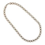 TIFFANY & CO.: A STERLING SILVER BEAD NECKLACE