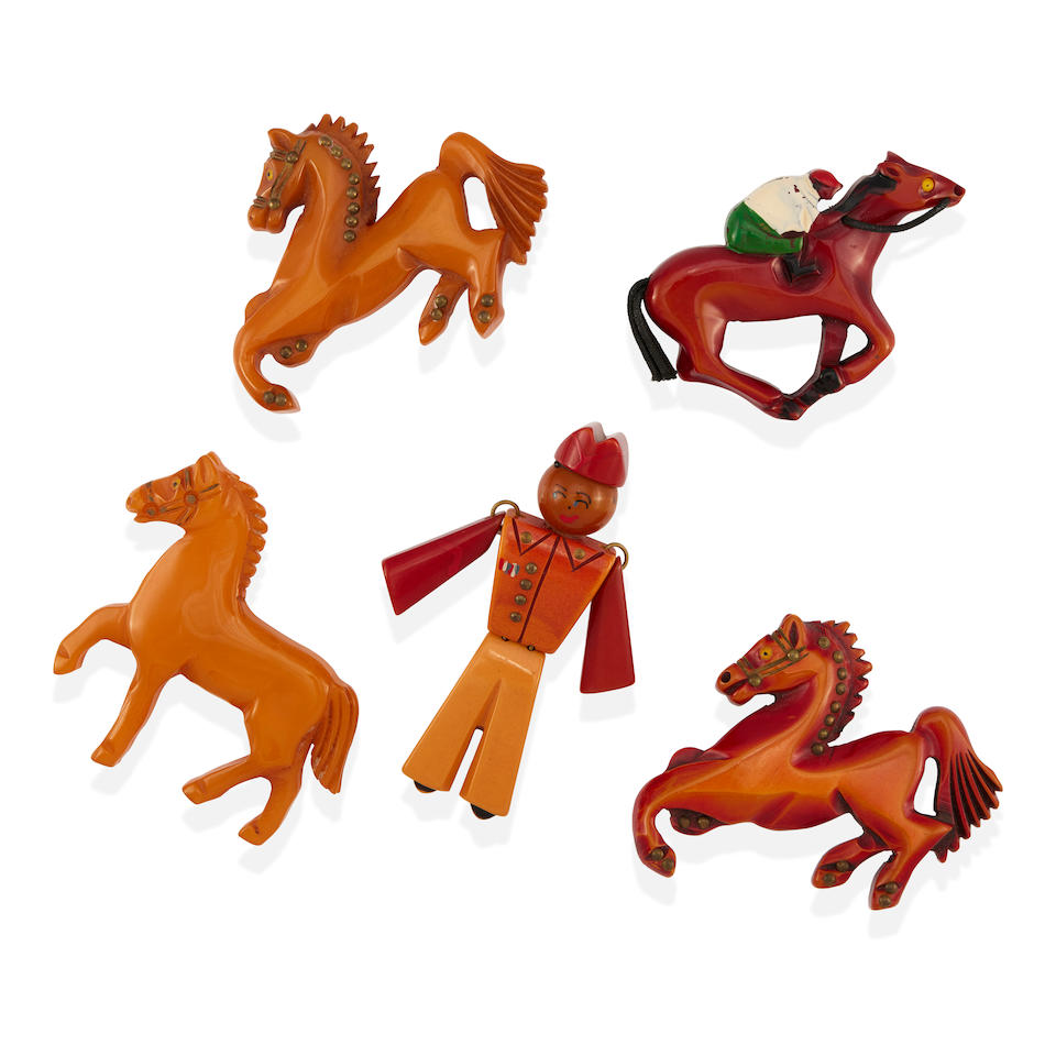 A GROUP OF BAKELITE FIGURATIVE BROOCHES