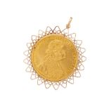 A 14K ROSE GOLD COIN FRAME PENDANT WITH AUSTRIAN COIN
