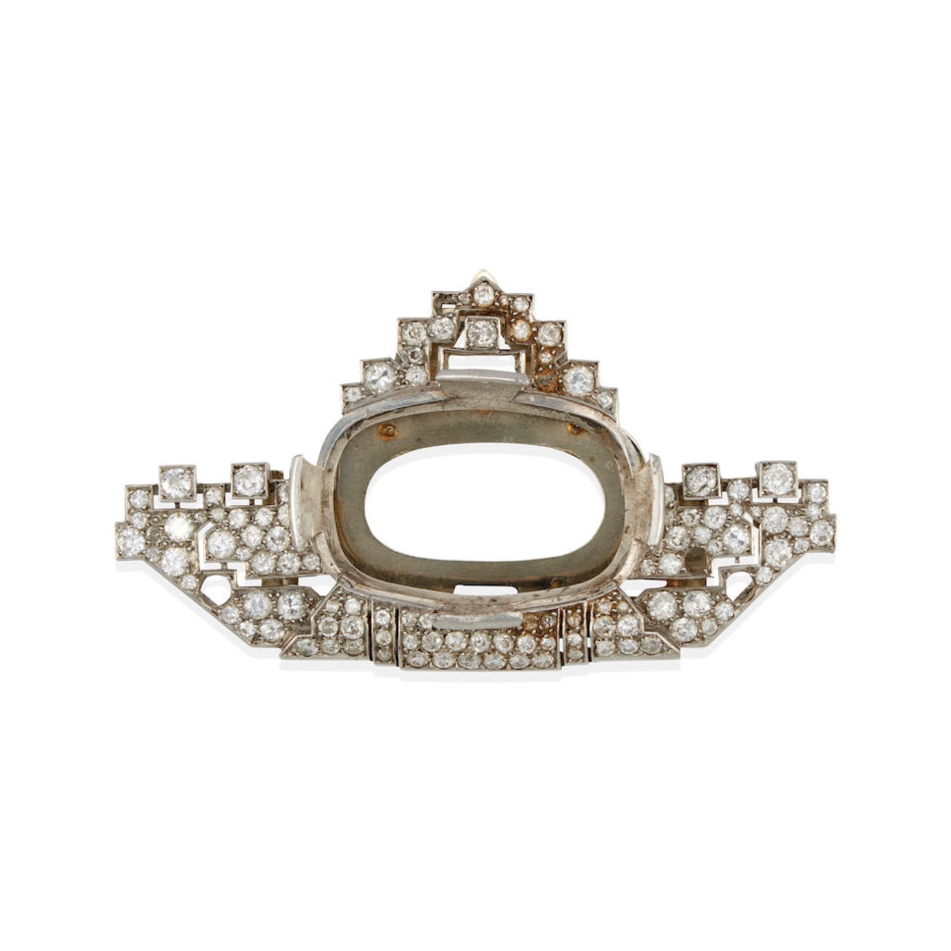 A PLATINUM, 18K WHITE GOLD AND DIAMOND SEMI-MOUNT CLIP