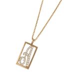 A GOLD AND DIAMOND INITIAL PENDANT NECKLACE