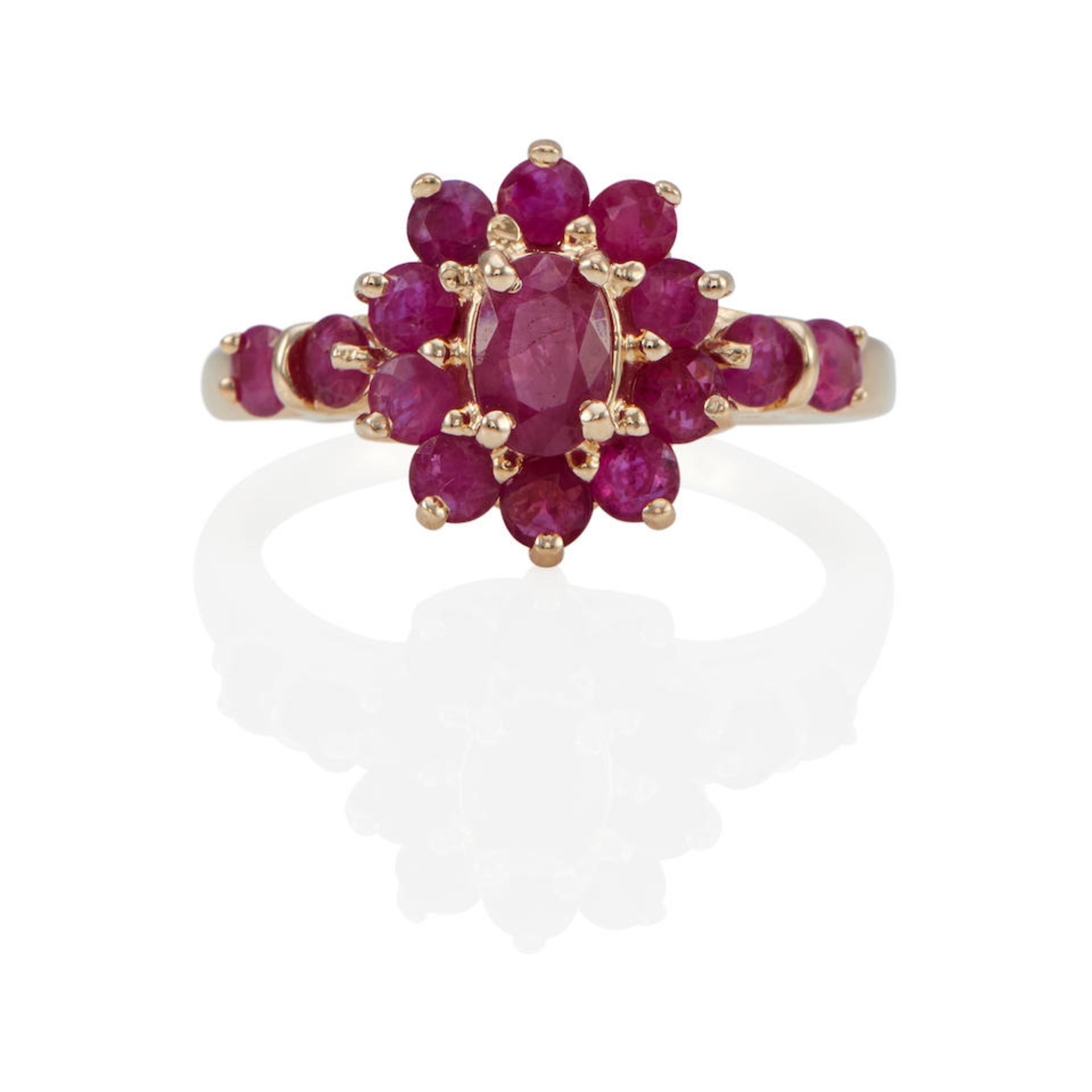 A 14K GOLD AND RUBY RING