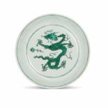 AN INCISED GREEN-ENAMELED 'DRAGON' DISH Kangxi six-character mark and of the period
