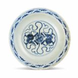 AN UNUSUAL AND LARGE BLUE AND WHITE 'LIONS' FOLIATE-RIM DISH Zhengde six-character mark, late Mi...