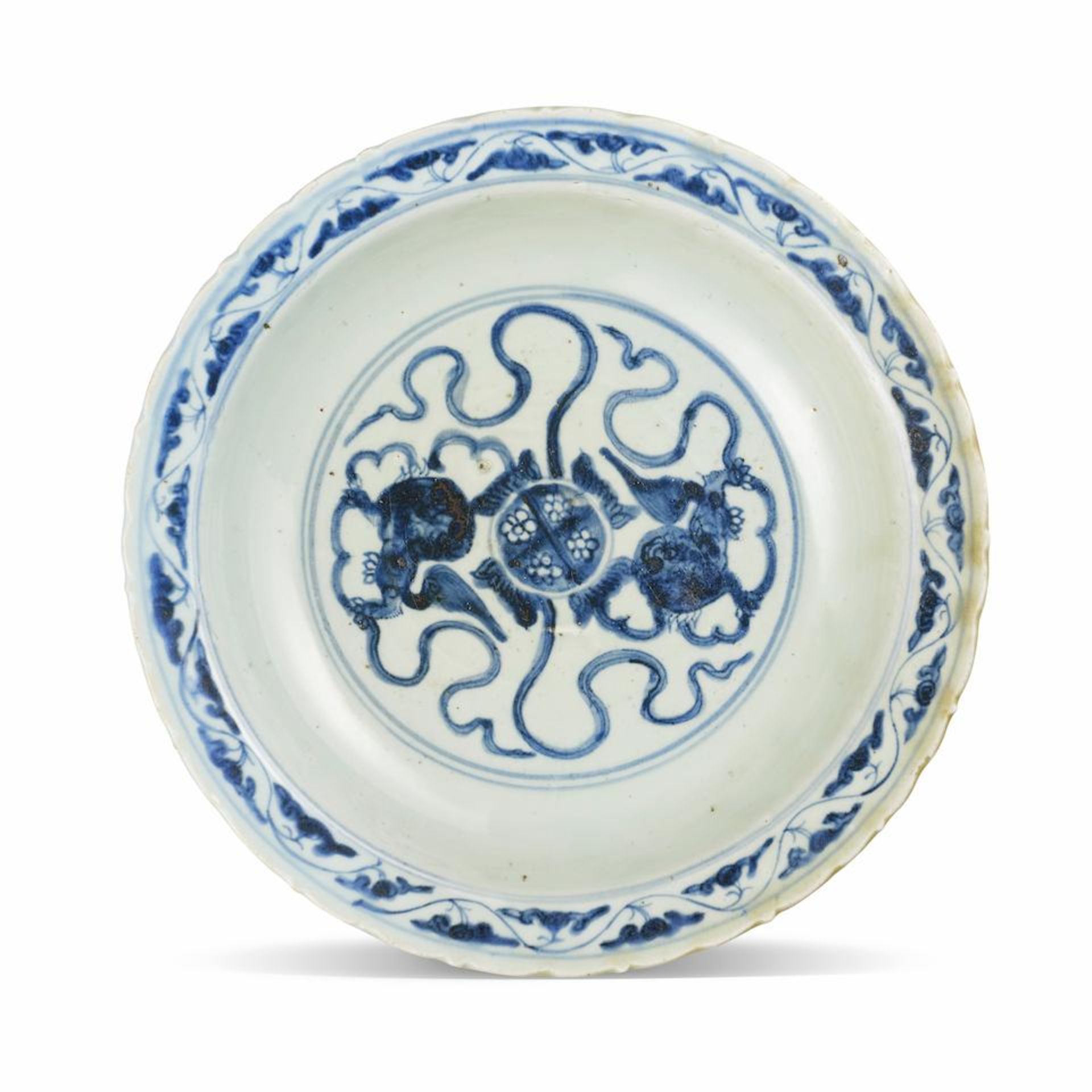 AN UNUSUAL AND LARGE BLUE AND WHITE 'LIONS' FOLIATE-RIM DISH Zhengde six-character mark, late Mi...