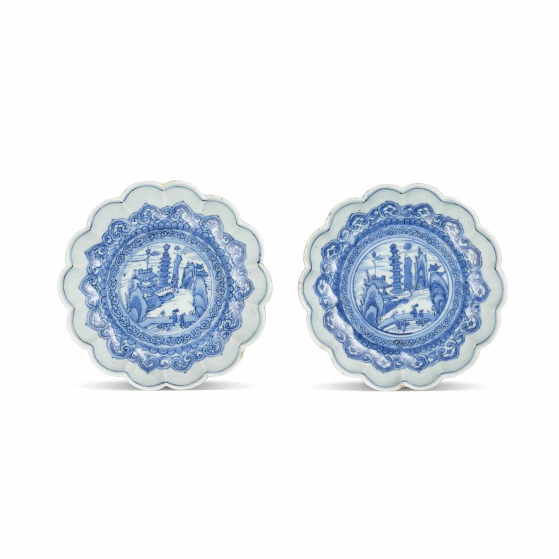 A PAIR OF BLUE AND WHITE FOLIATE-RIM DISHES Tianqi