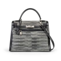 Hermès: a Black Gulliver Leather and Vibrato Sellier Kelly 32 1999 (includes padlock, keys,...