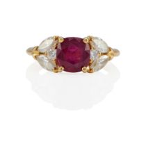 AN 18K GOLD RUBY AND DIAMOND RING
