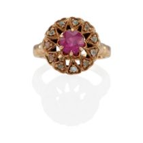 A 9K GOLD, SYNTHETIC RUBY AND DIAMOND RING