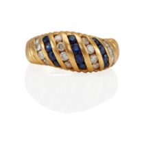 AN 18K GOLD, DIAMOND AND SAPPHIRE RING