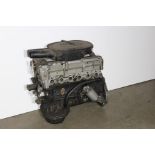 A Mercedes-Benz M110 twin cam 2.8 liter inline 6 engine 31 inches in height, 15 inches in width,...