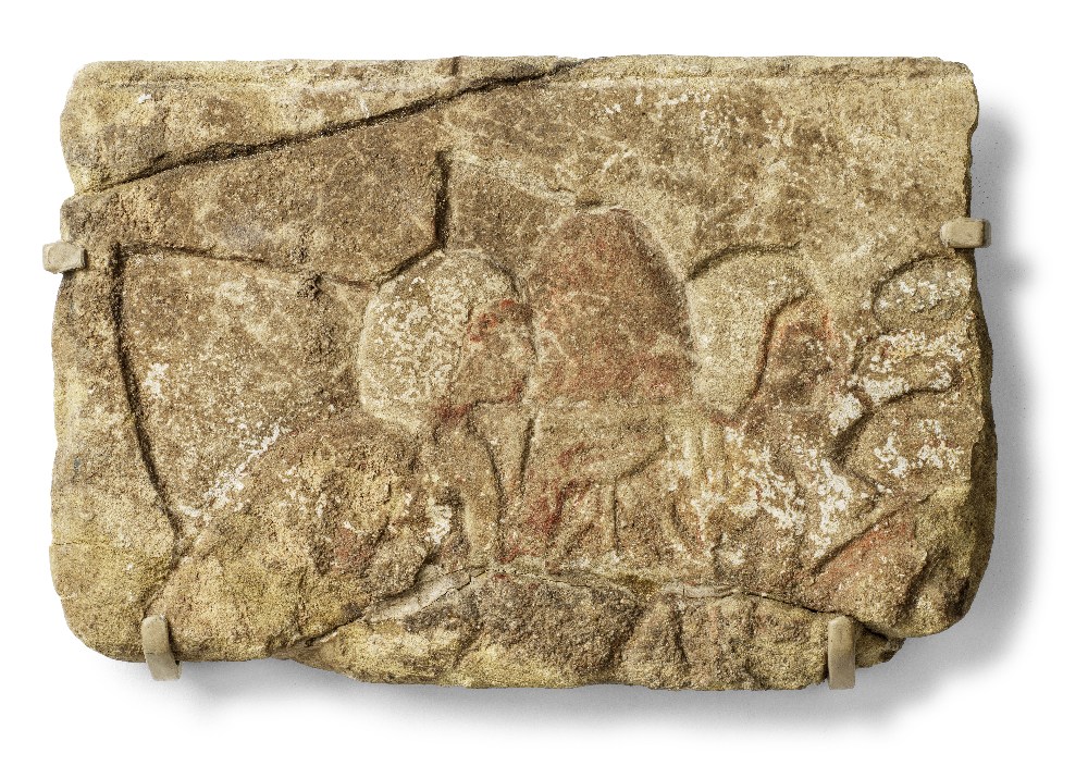 An Egyptian sandstone relief fragment