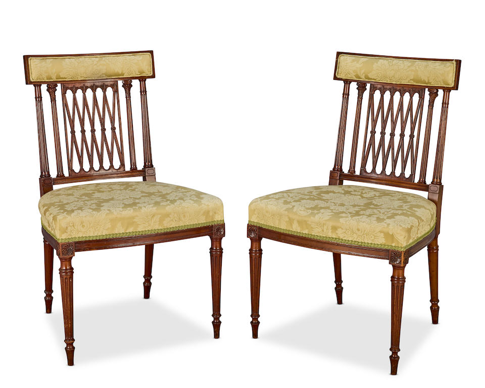 A pair of George III mahogany side chairs Circa 1795, after a Gillows design and also probably m...