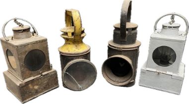 A collection of four antique railway lanterns included L.M.S [32cm]