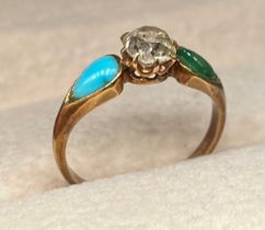 19th century antique 18ct yellow gold ring set with a roundish cut diamond, flanked by green and