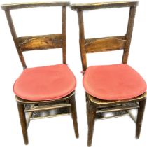 A pair of oak church chairs