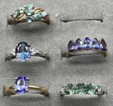 Four various 10ct gold rings and one 9ct gold ring fitted with various gem stones. [9ct- 2.